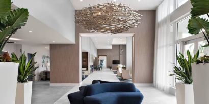 Lobby and coworking lounge at Courtyard Delray Beach.
