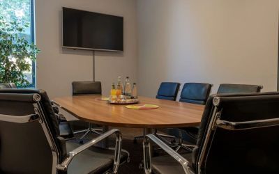 Professional meeting room at London City Airport Hotel.