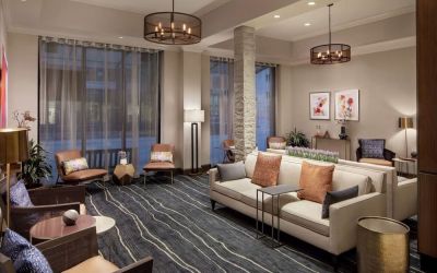 Lobby and coworking lounge at Embassy Suites By Hilton Fort Worth Downtown.
