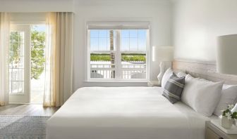Romantic king room with natural light at Parrot Key Hotel & Villas.