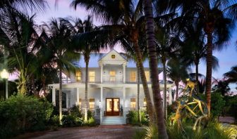Hotel exterior at dusk at Parrot Key Hotel & Villas.