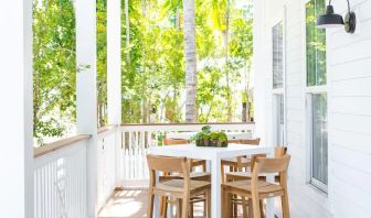 Bar chairs and tables at Parrot Key Hotel & Villas.