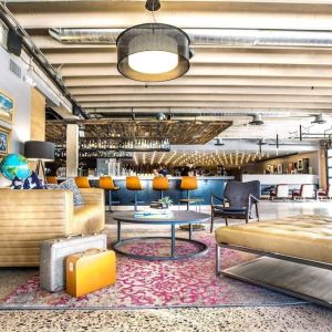 Lobby and coworking lounge at Moxy Phoenix Tempe/ASU Area.