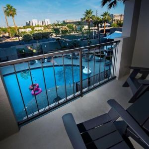 Balcony inside day use room with a view of the pool at Moxy Phoenix Tempe/ASU Area.