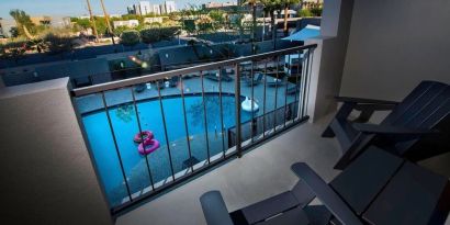 Balcony inside day use room with a view of the pool at Moxy Phoenix Tempe/ASU Area.