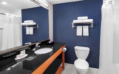Guest bathroom with shower at Fairfield Inn By Marriott Denver Airport.