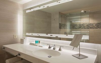Guest bathroom with shower at Hyatt Regency Dallas.