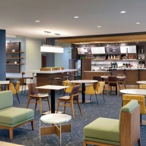 Dining area perfect for coworking at Courtyard By Marriott Houston NASA/Clear Lake.