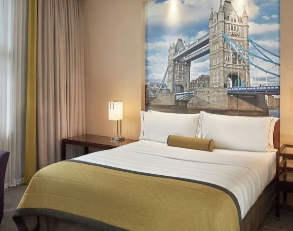 King bed at Threadneedles, Marriott Autograph Collection Hotel.