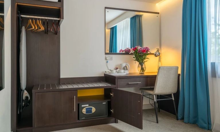 In room workspace at Pelican London Residence & Hotel.