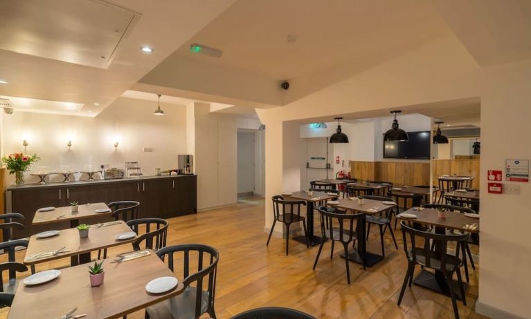 Dining area at Pelican London Residence & Hotel.