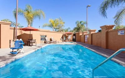 Refreshing outdoor pool at Holiday Inn Express & Suites Corona.