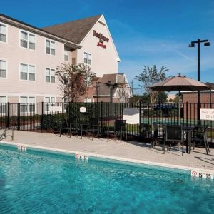 Refreshing outdoor pool at Residence Inn By Marriott Hattiesburg.
