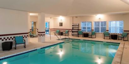 Refreshing indoor pool at Residence Inn By Marriott Bentonville Rogers.