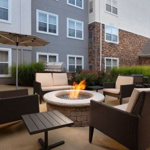 Firepit and outdoor furniture at Residence Inn By Marriott Bentonville Rogers.