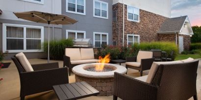 Firepit and outdoor furniture at Residence Inn By Marriott Bentonville Rogers.