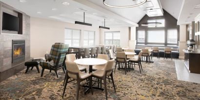 Lobby and coworking lounge at Residence Inn By Marriott Bentonville Rogers.