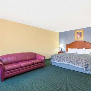 Spacious day use room with sofa at Blue Way Inn & Suites Wichita East.