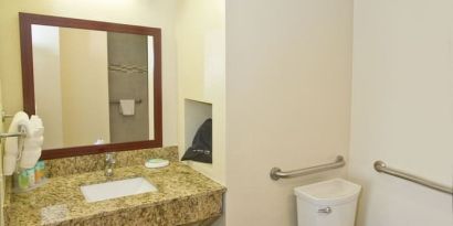 Guest bathroom with shower at The Stevenson Monterey.