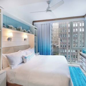 King bed with city views at Margaritaville Resort Times Square.