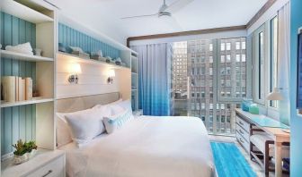 King bed with city views at Margaritaville Resort Times Square.