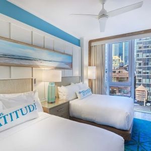 Day room with queen beds at Margaritaville Resort Times Square.