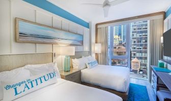 Day room with queen beds at Margaritaville Resort Times Square.