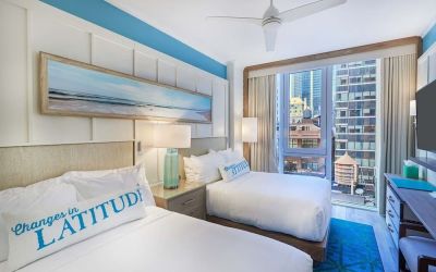 Day room with queen beds at Margaritaville Resort Times Square.