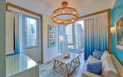 Day use room with lounge area at Margaritaville Resort Times Square.