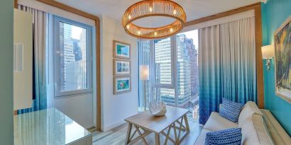 Day use room with lounge area at Margaritaville Resort Times Square.