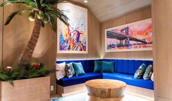 Coworking lobby seating at Margaritaville Resort Times Square.