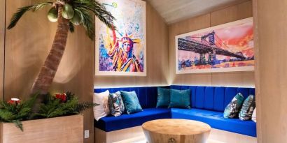 Coworking lobby seating at Margaritaville Resort Times Square.