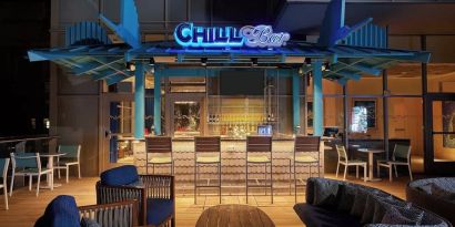Hotel bar at night at Margaritaville Resort Times Square.