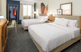 Day room with queen beds at Spark By Hilton Kannapolis.