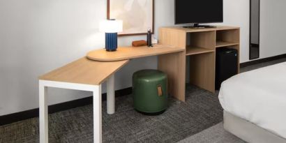 Day room with work space at Spark By Hilton Kannapolis.