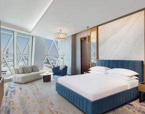 King room with TV at Velero Hotel Doha Lusail.
