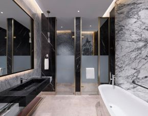 King room with bathroom at Velero Hotel Doha Lusail.
