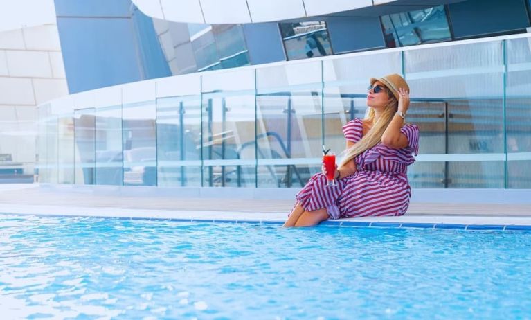 Outdoor pool at Velero Hotel Doha Lusail.