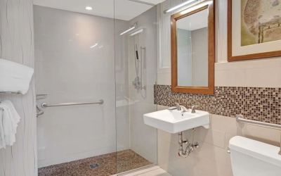 Guest bathroom with shower at Wyndham Garden Chinatown NYC.