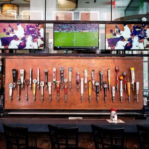 Hotel bar TV at Wyndham Garden Chinatown NYC.