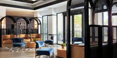 Lobby and coworking lounge at Renaissance Boca Raton Hotel.

