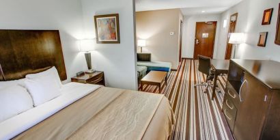 Day use room with living area at Comfort Inn & Suites Triadelphia.