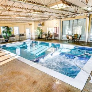 Refreshing indoor pool at Comfort Inn & Suites Triadelphia.