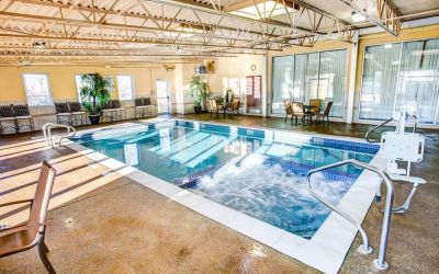 Refreshing indoor pool at Comfort Inn & Suites Triadelphia.