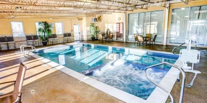 Refreshing indoor pool at Comfort Inn & Suites Triadelphia.