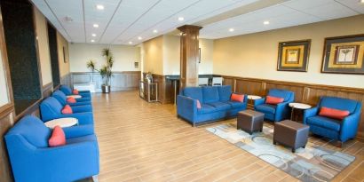 Lobby and coworking lounge at Comfort Inn & Suites Triadelphia.