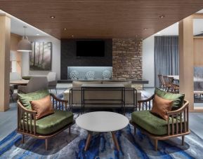Lobby and coworking lounge at Fairfield Inn & Suites By Marriott Kenosha Pleasant Prairie.