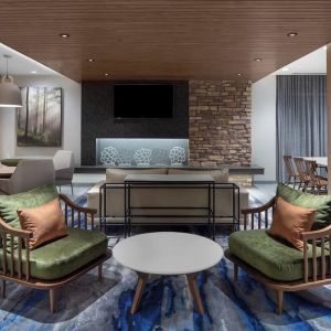 Lobby and coworking lounge at Fairfield Inn & Suites By Marriott Kenosha Pleasant Prairie.