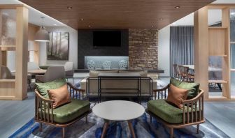 Lobby and coworking lounge at Fairfield Inn & Suites By Marriott Kenosha Pleasant Prairie.