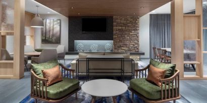 Lobby and coworking lounge at Fairfield Inn & Suites By Marriott Kenosha Pleasant Prairie.